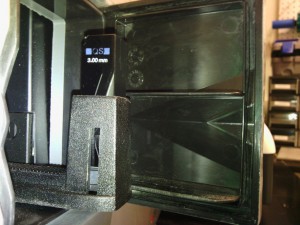 Cuvette on spacer in Tecan