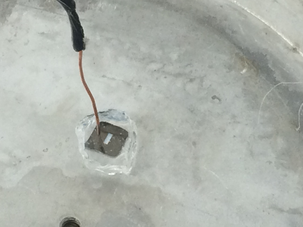 Tried bonding a broken glass piece to silicon nitride. It failed, probably due to lack of contact.