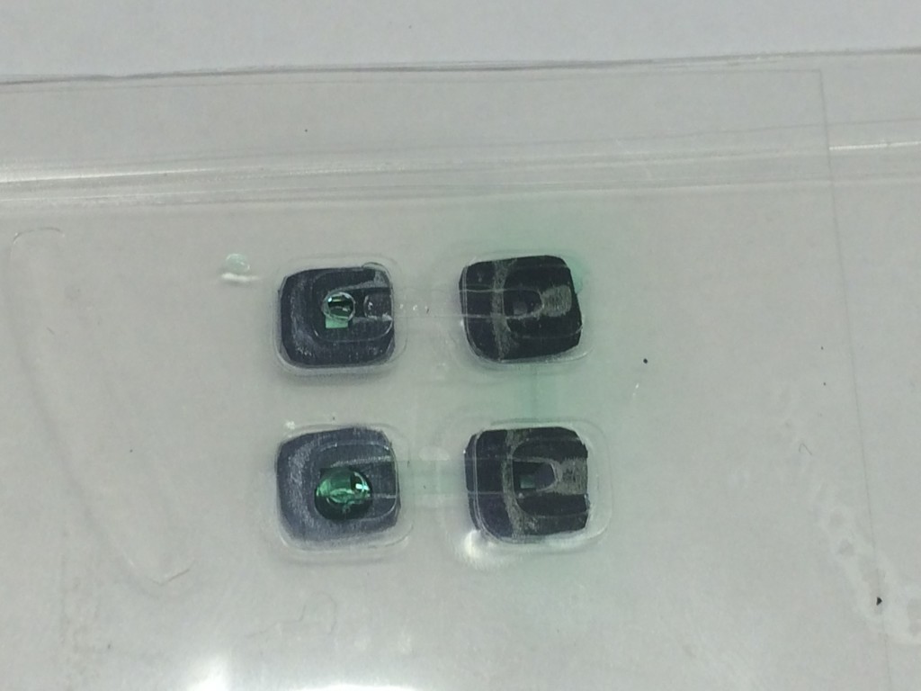 8 layer device. Water routes across, down and back through 3 chips. Some in-plane leaking is observed around the top right chip. 