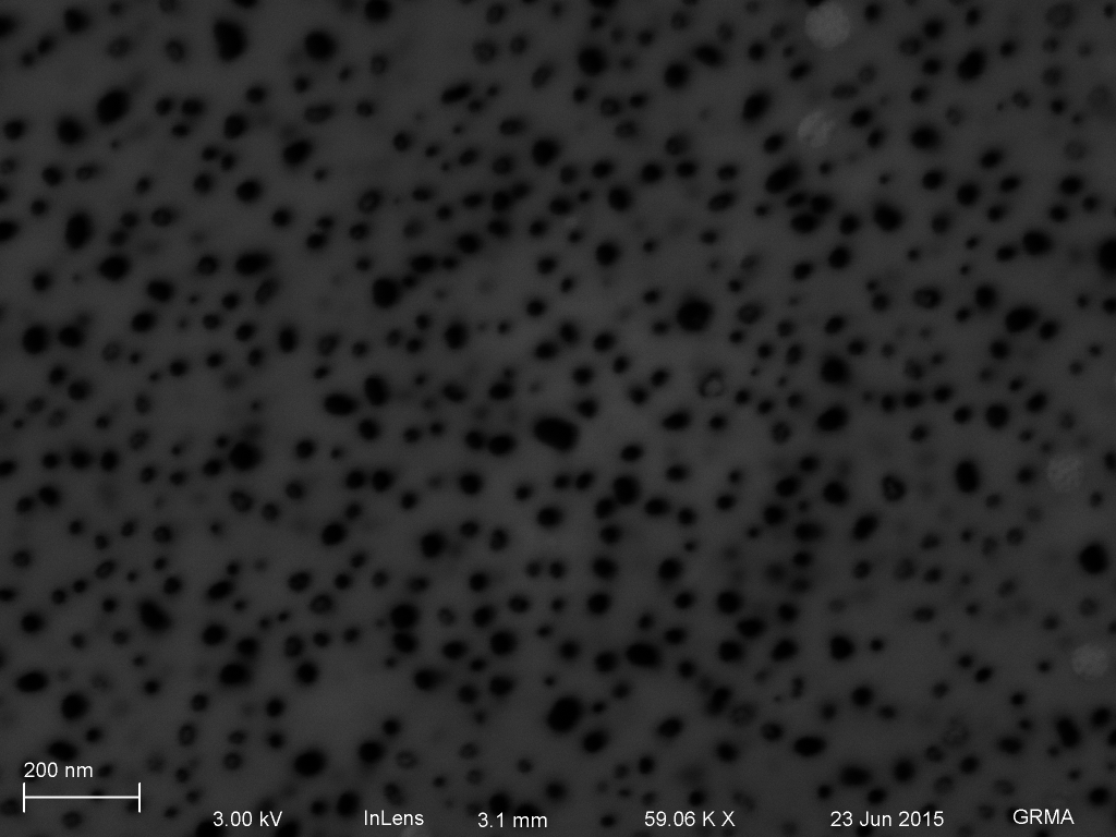 Small 25 nm particle near hole.